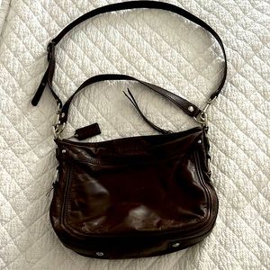Coach brown leather shoulder bag with chrome accents
